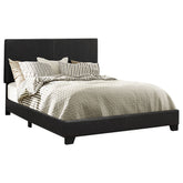Orleans Furniture - Coaster - Dorian Faux Leather Upholstered Eastern King Panel Bed Black - 300761KE