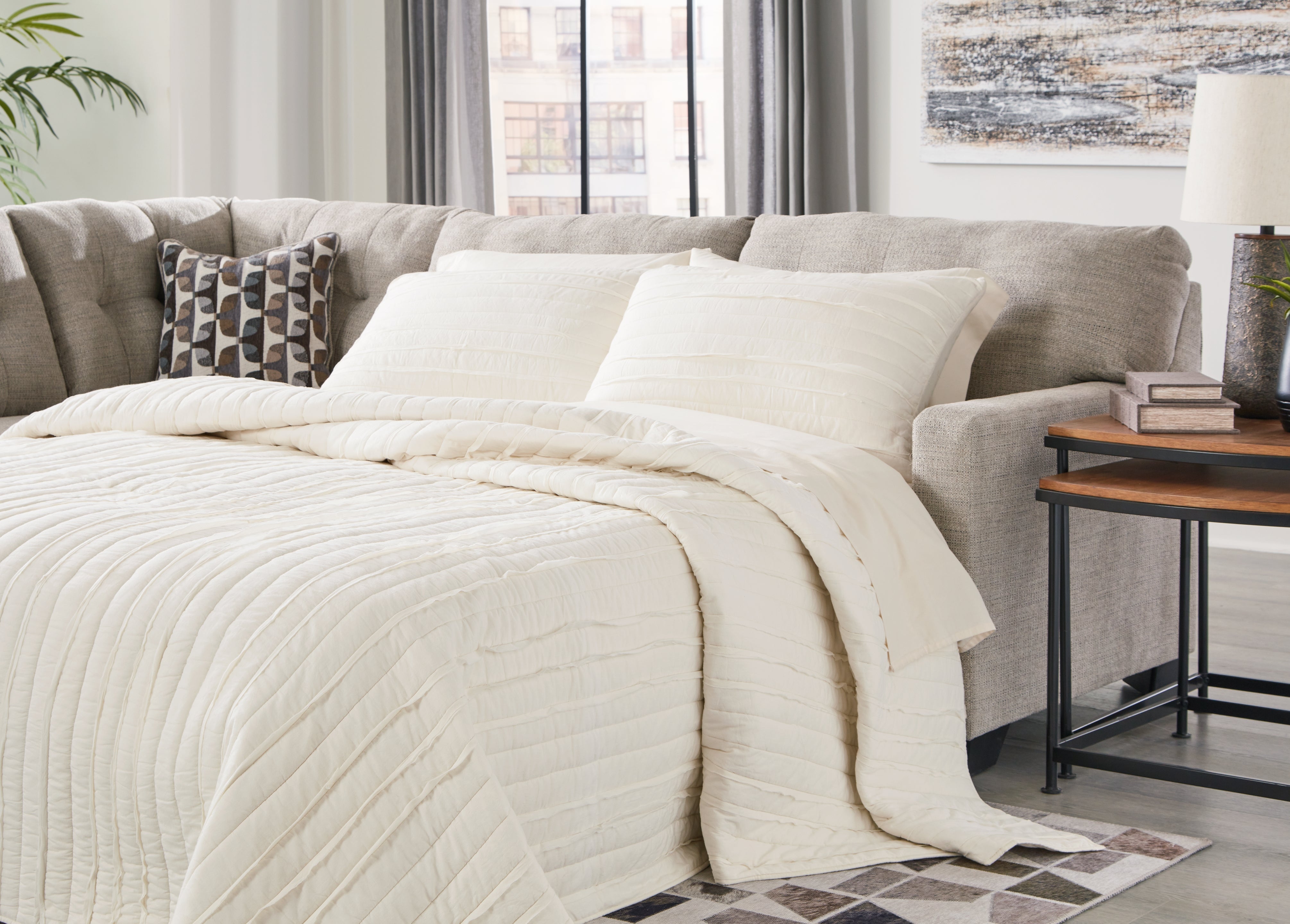 Orleans Furniture - Ashley Furniture - Mahoney Sectional - 2-Piece Sleeper Sectional with Chaise / Chocolate - 31005S4