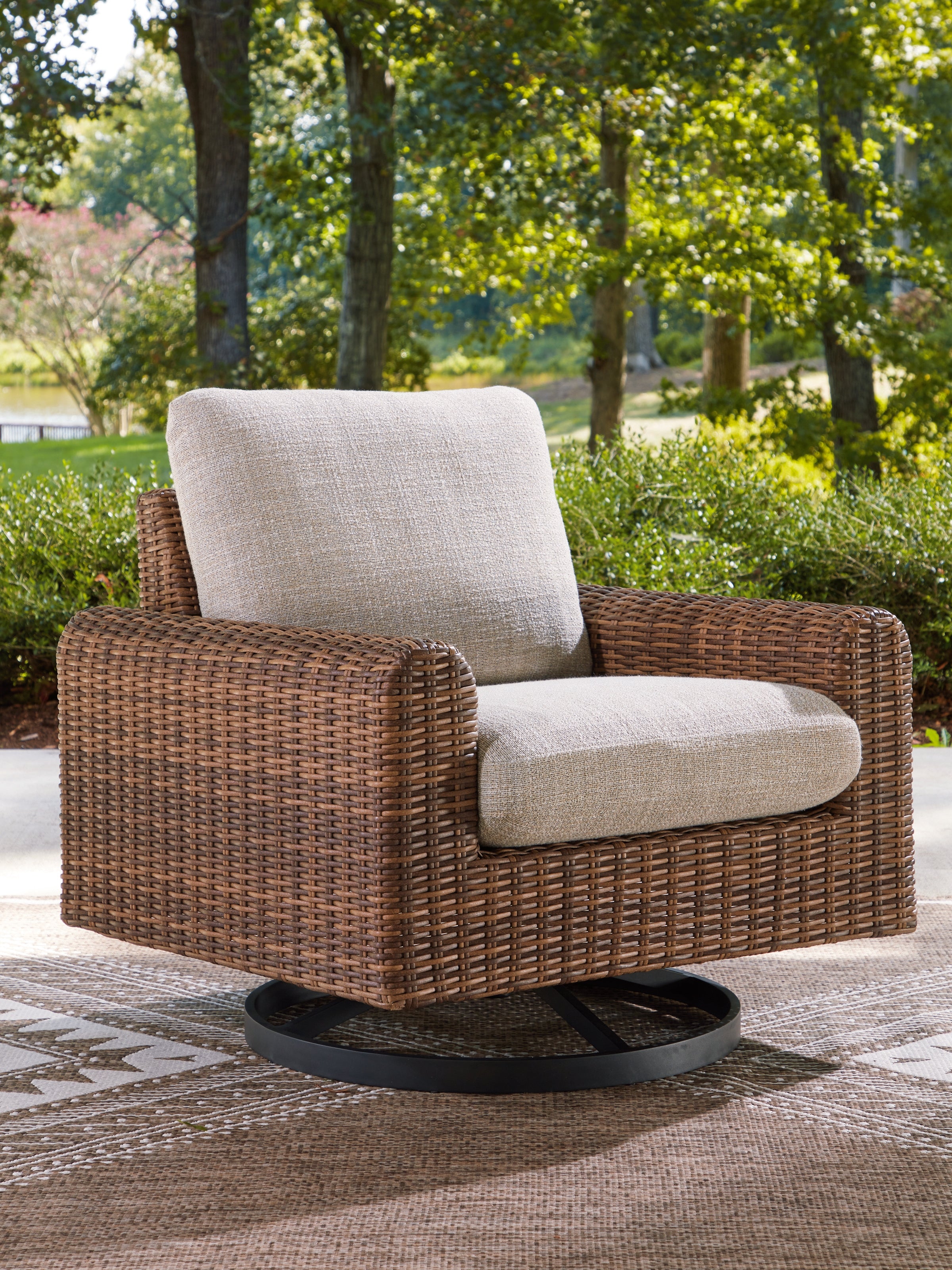 Orleans Furniture - Ashley Furniture - Dolan Creek Outdoor - Swivel Lounge w/ Cushion / Gray/Brown - PCP610-821