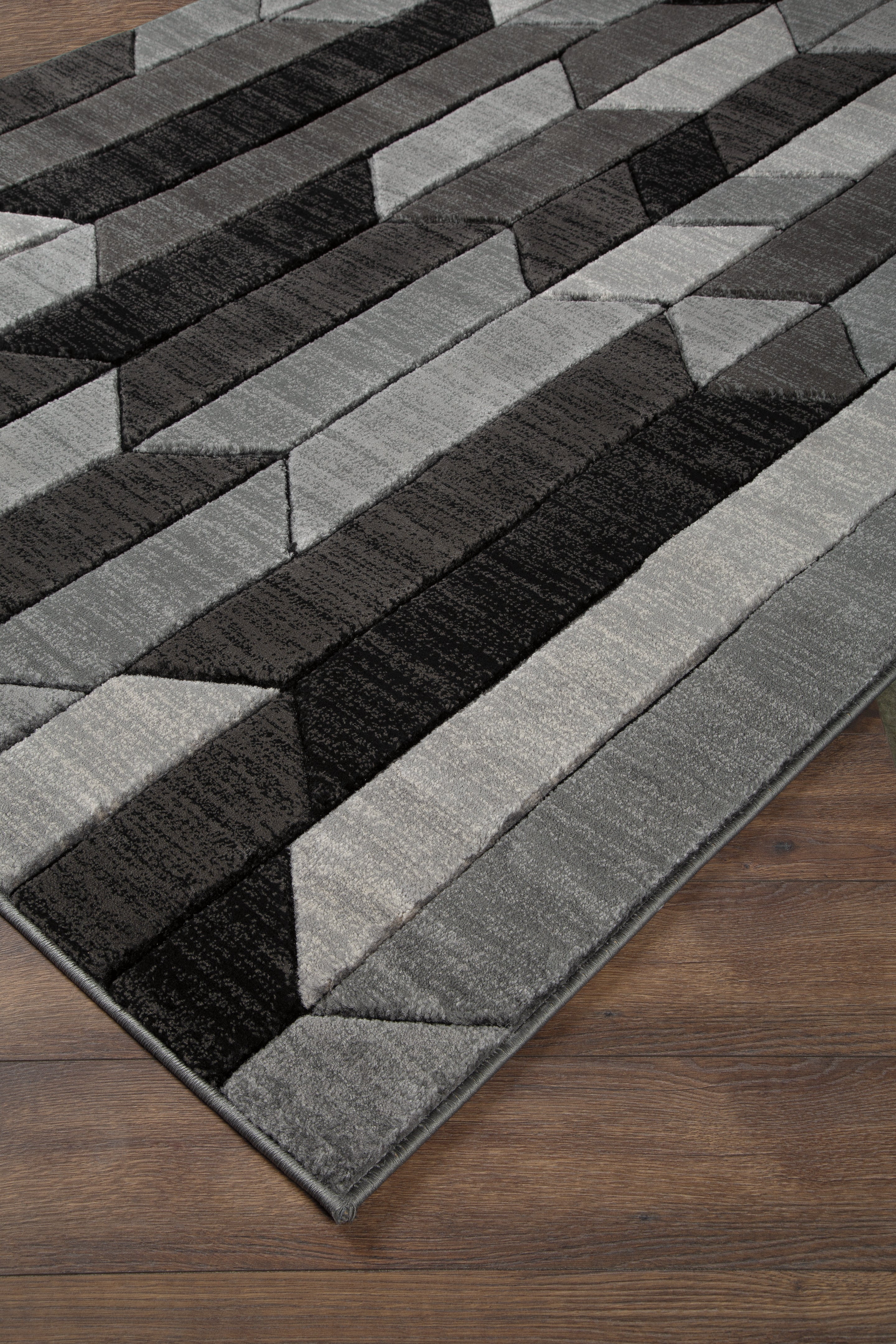 Orleans Furniture - Ashley Furniture - Chayse Rug - 6'6" x 9'6" Rug / Black/Gray - R403461