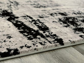 Orleans Furniture - Ashley Furniture - Zekeman Rug - 7'10" x 10' Rug / Black/Cream/Gray - R404921