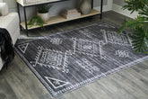 Orleans Furniture - Ashley Furniture - Arloman Rug - 5' x 7' Washable Rug / Black/Cream/Gray - R405932
