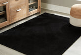 Orleans Furniture - Ashley Furniture - Anaben Rug - 5' x 7' Washable Rug / Black - R406312