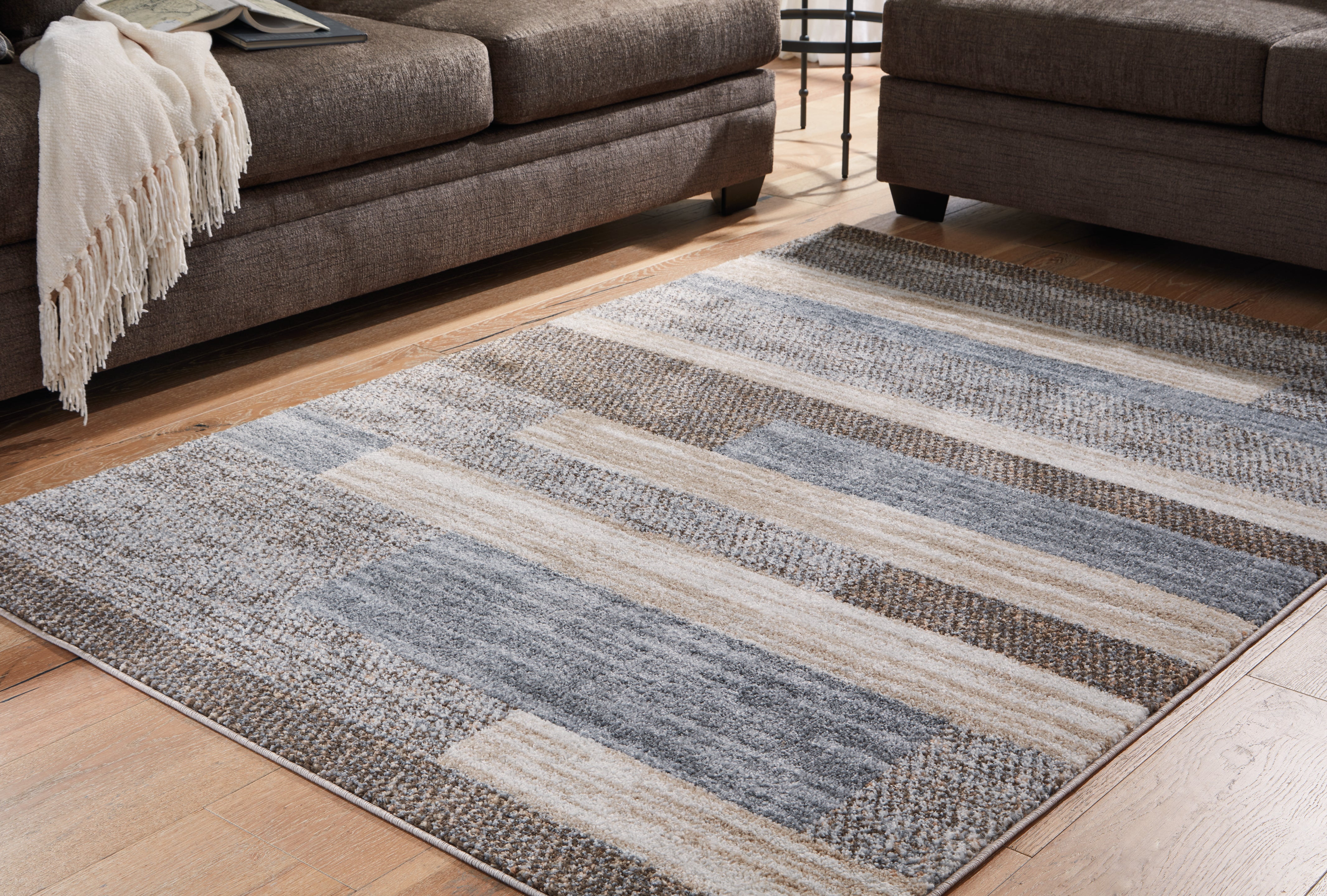 Orleans Furniture - Ashley Furniture - Sethburn Rug - 5' x 7' Rug / Cream/Brown/Gray - R406592
