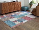 Orleans Furniture - Ashley Furniture - Numore Rug - 5'2" x 6'11" Washable Rug / Multi - R406662