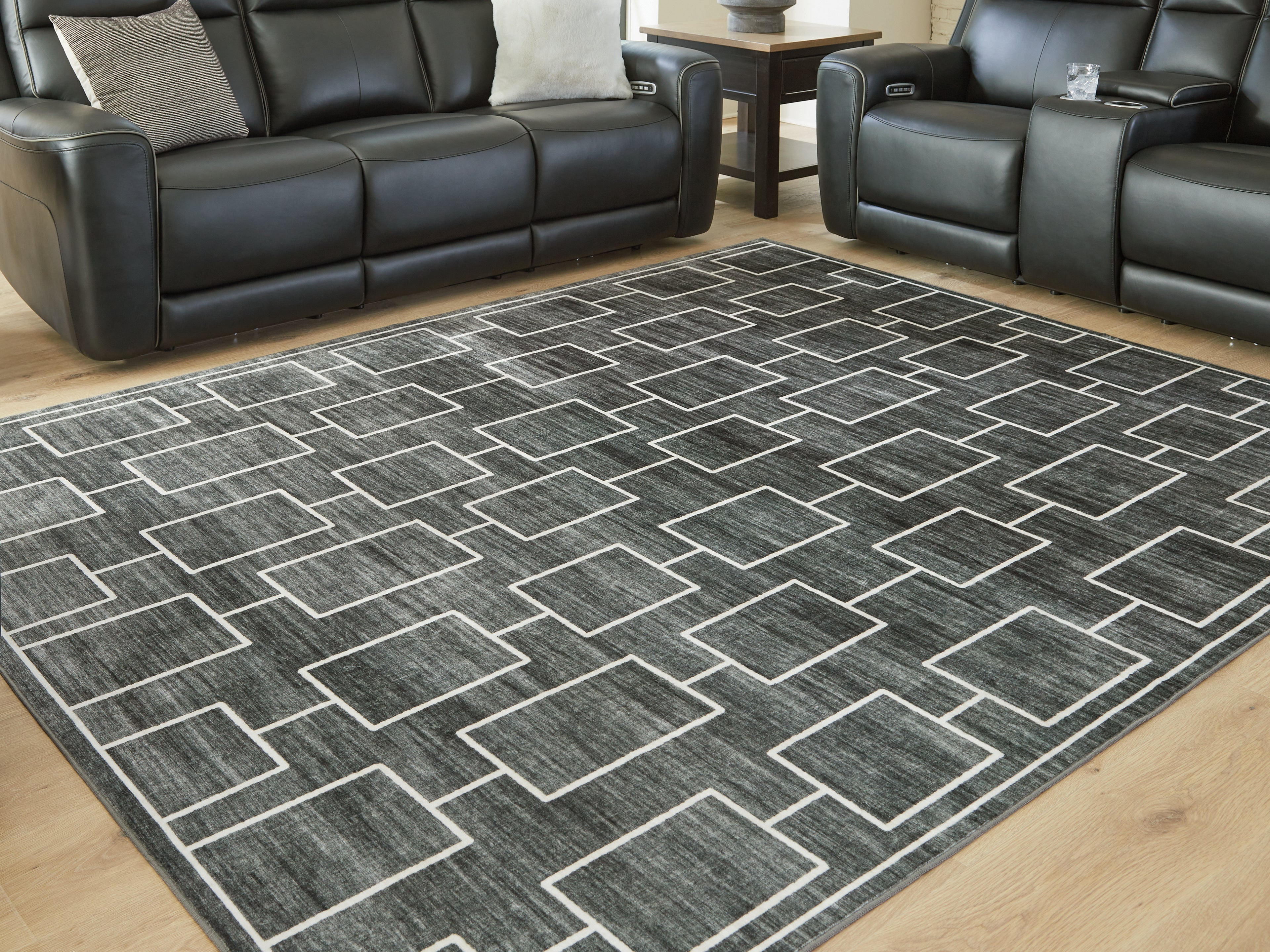Orleans Furniture - Ashley Furniture - Elderland Rug - Washable 7'6" x 9'6" Area Rug / Black/Gray - R407401