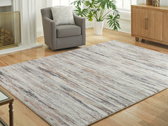 Orleans Furniture - Ashley Furniture - Nace Rug - 5' x 7' Area Rug / Gray/Brown/White - R407472