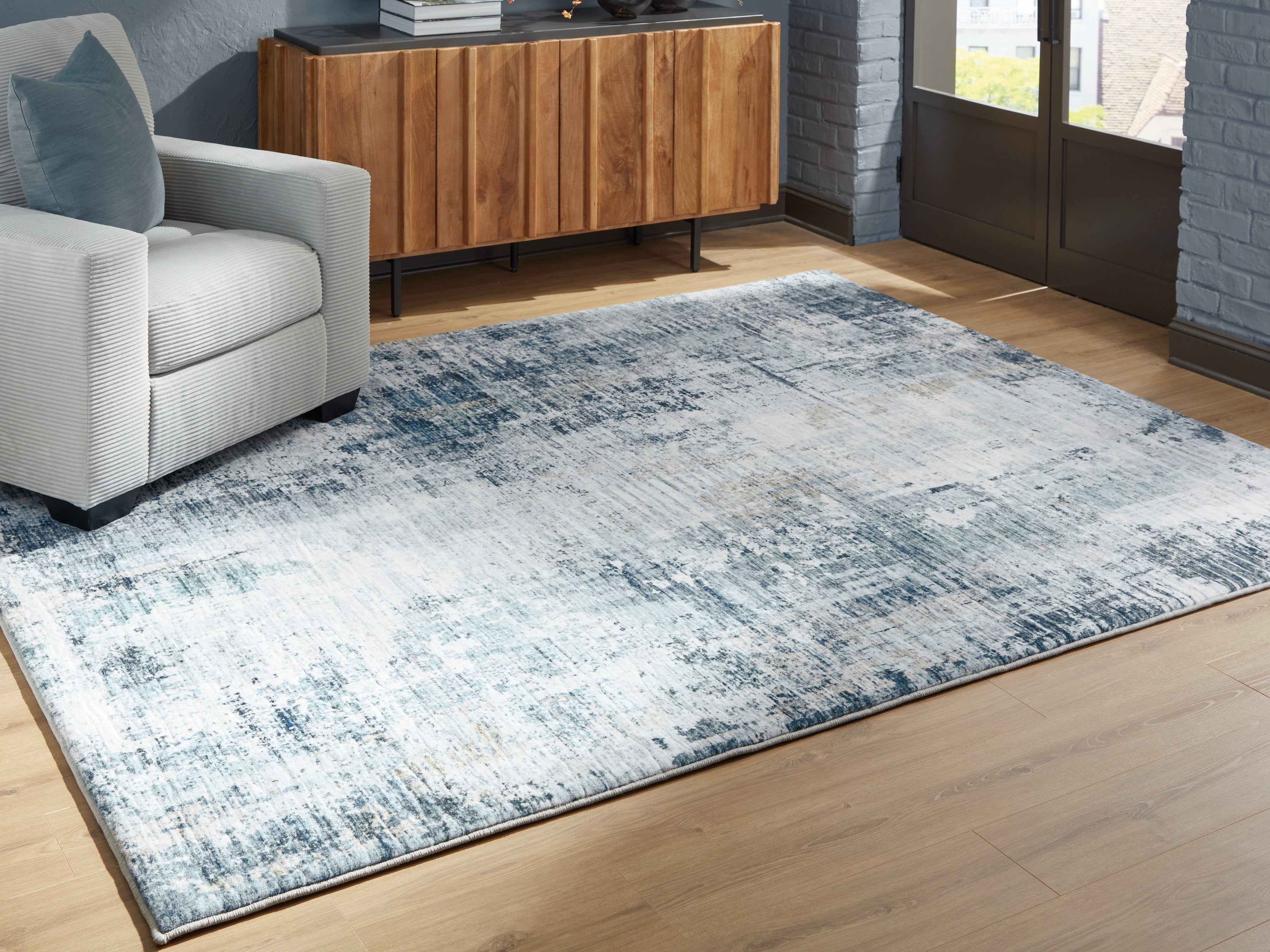 Orleans Furniture - Ashley Furniture - Arlenmont Rug - 5' x 7' Area Rug / Blue/White/Brown - R407482