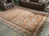 Orleans Furniture - Ashley Furniture - Qaabiz Rug - 7'8" x 10' Area Rug / Sienna/Ivory/Black - R407521