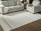 Orleans Furniture - Ashley Furniture - Gadence Rug - 5' x 7' Area Rug / Ivory/Tan - R407642