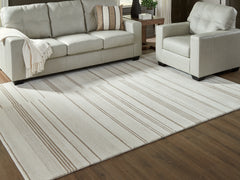 Orleans Furniture - Ashley Furniture - Gadence Rug - 5' x 7' Area Rug / Ivory/Tan - R407642
