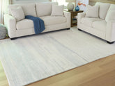 Orleans Furniture - Ashley Furniture - Genemost Rug - 5' x 7' Area Rug / Ivory/Blue - R407842