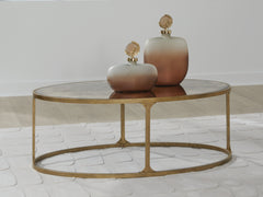 Orleans Furniture - Ashley Furniture - Korajane Coffee Table - Oval Cocktail Table / Antique Gold - T399-0