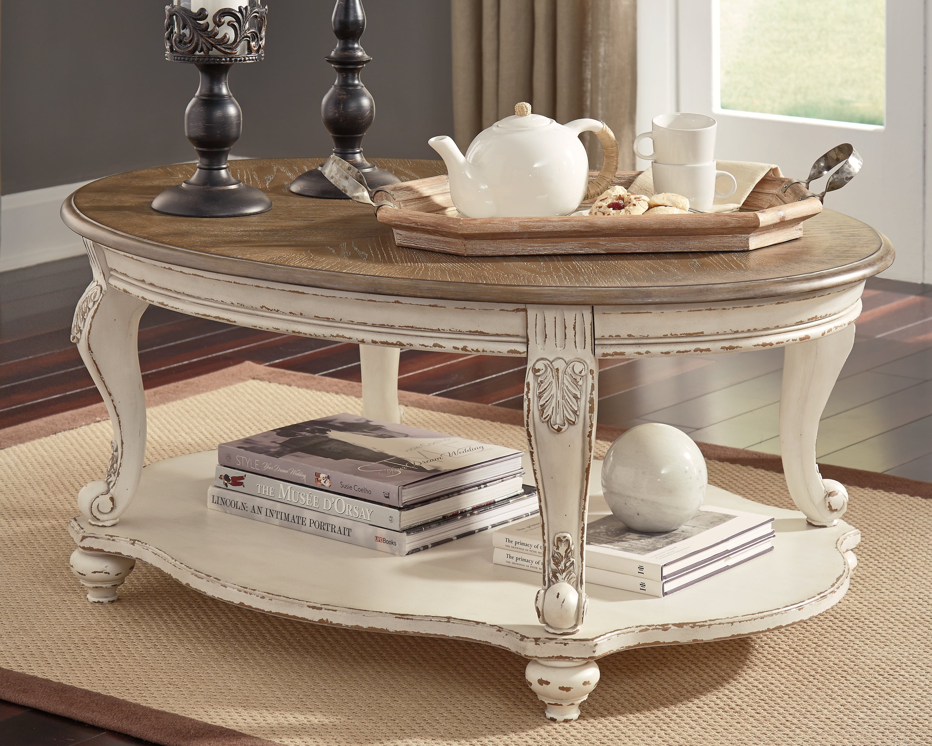 Orleans Furniture - Ashley Furniture - Realyn Coffee Table - Oval Cocktail Table / White/Brown - T743-0