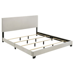 Orleans Furniture - Coaster - Dorian Fabric Upholstered California King Panel Bed Cream - 300852KW