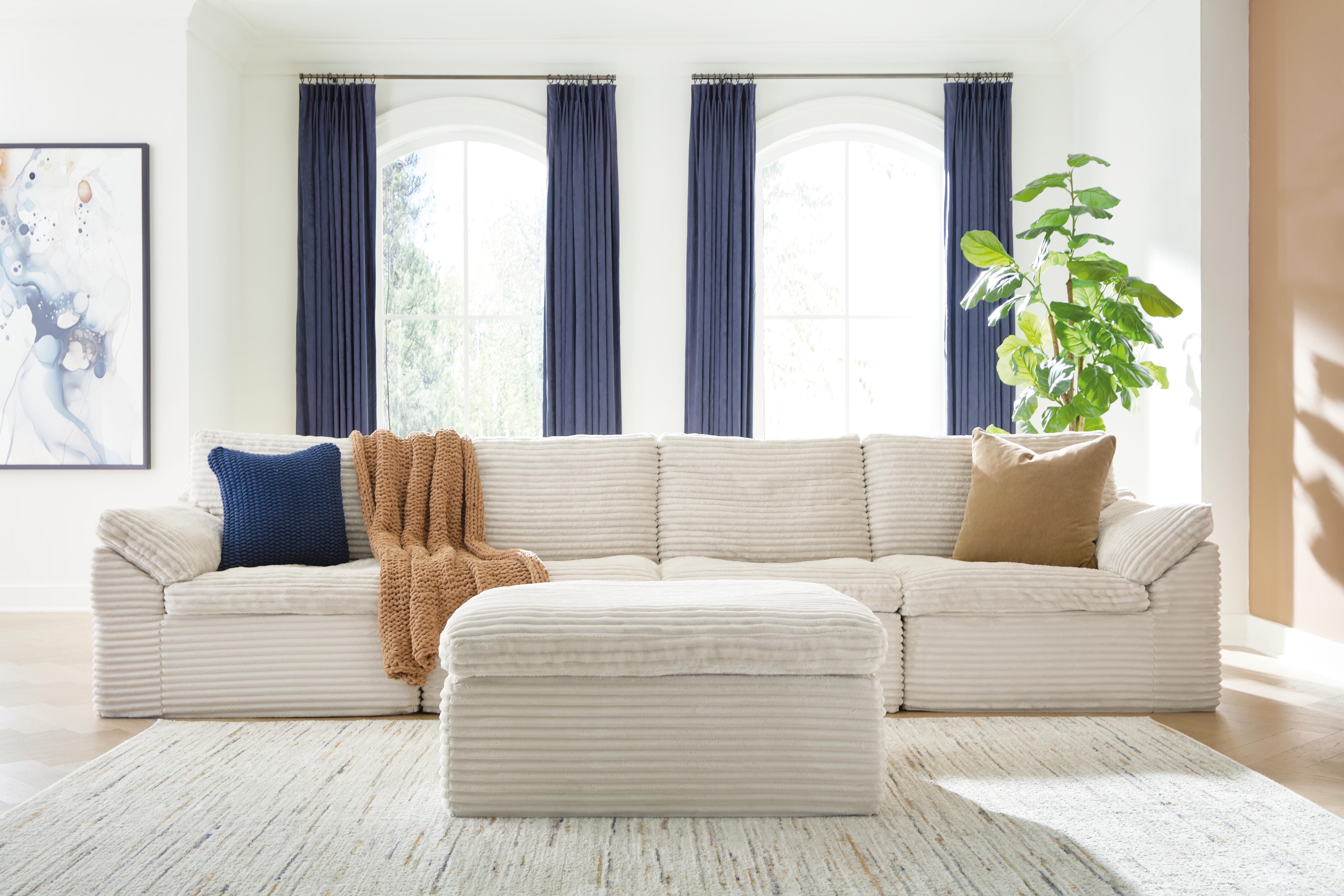 Orleans Furniture - Ashley Furniture - Fannin Sectional - RAF 4-Piece Sectional with Ottoman / Ivory - PC84304S1