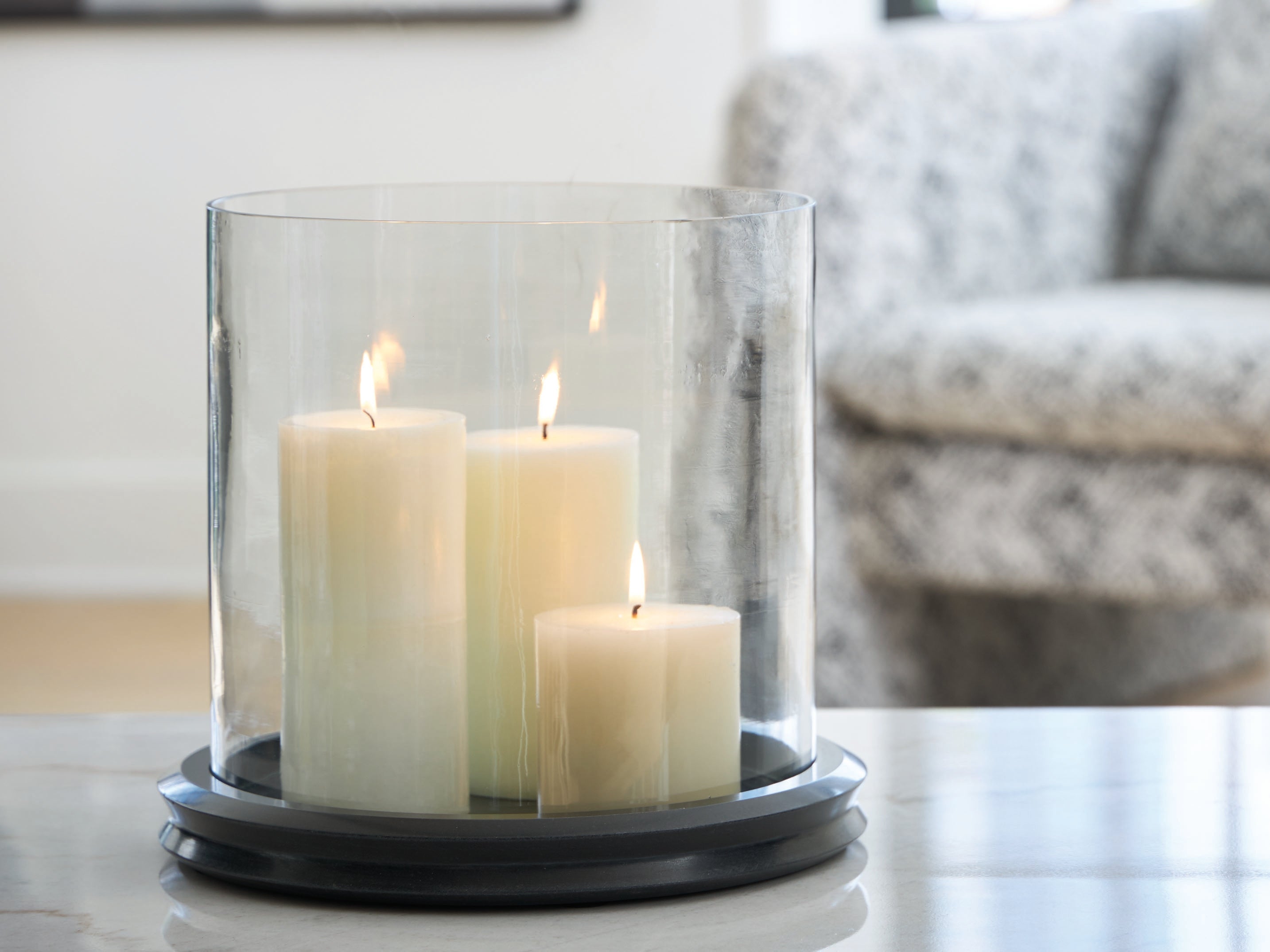 Orleans Furniture - Ashley Furniture - Saskia Candle Holder - Candle Holder / Clear/Black - A2000846