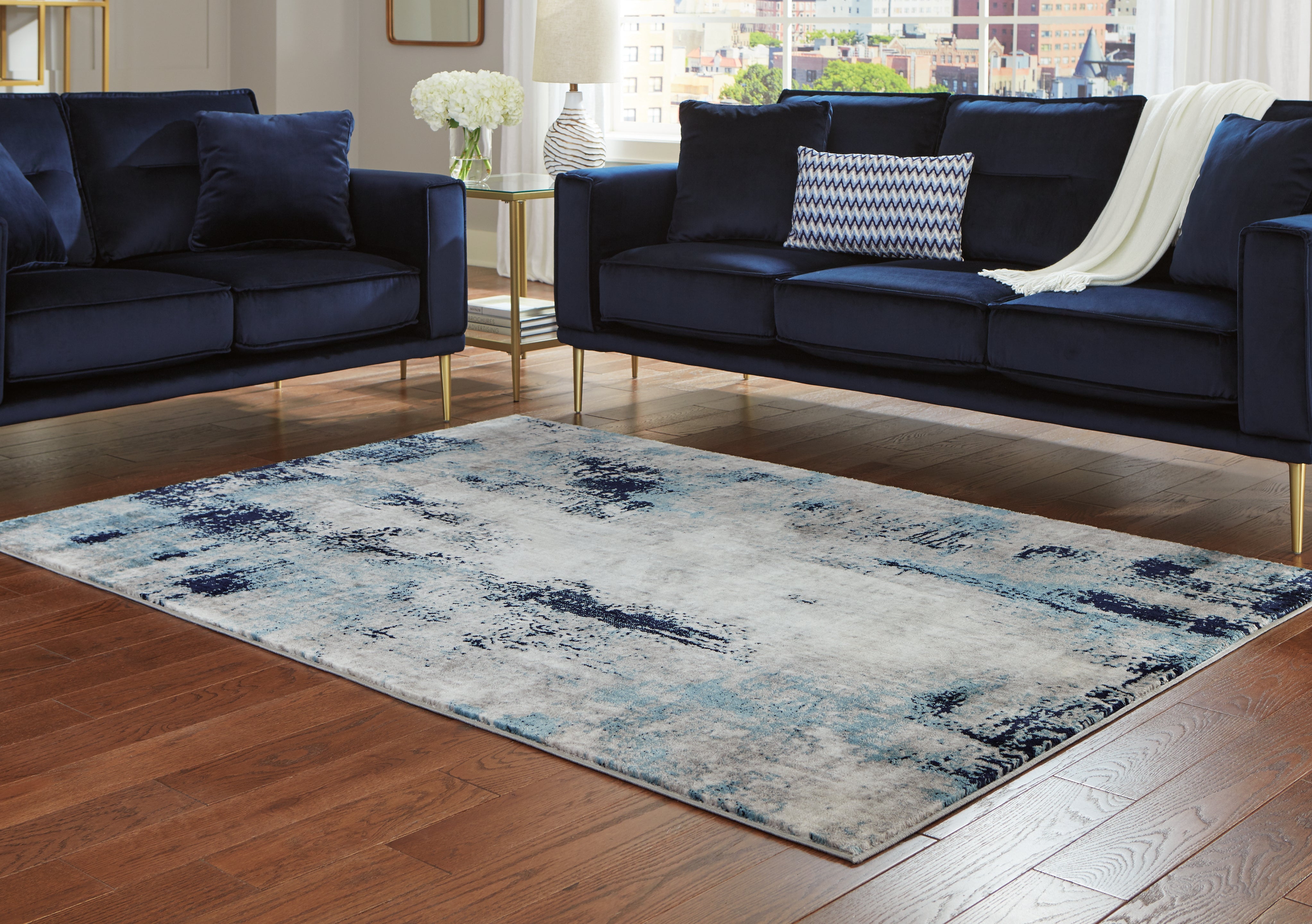 Orleans Furniture - Ashley Furniture - Leonelle Rug - 7'10" x 10' Rug / White/Blue/Gray - R404871