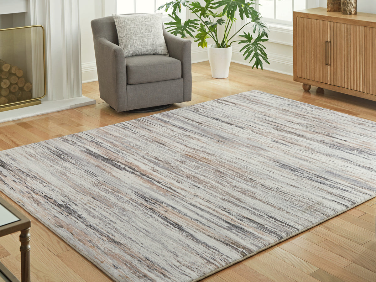 Orleans Furniture - Ashley Furniture - Nace Rug - 5' x 7' Area Rug / Gray/Brown/White - R407472