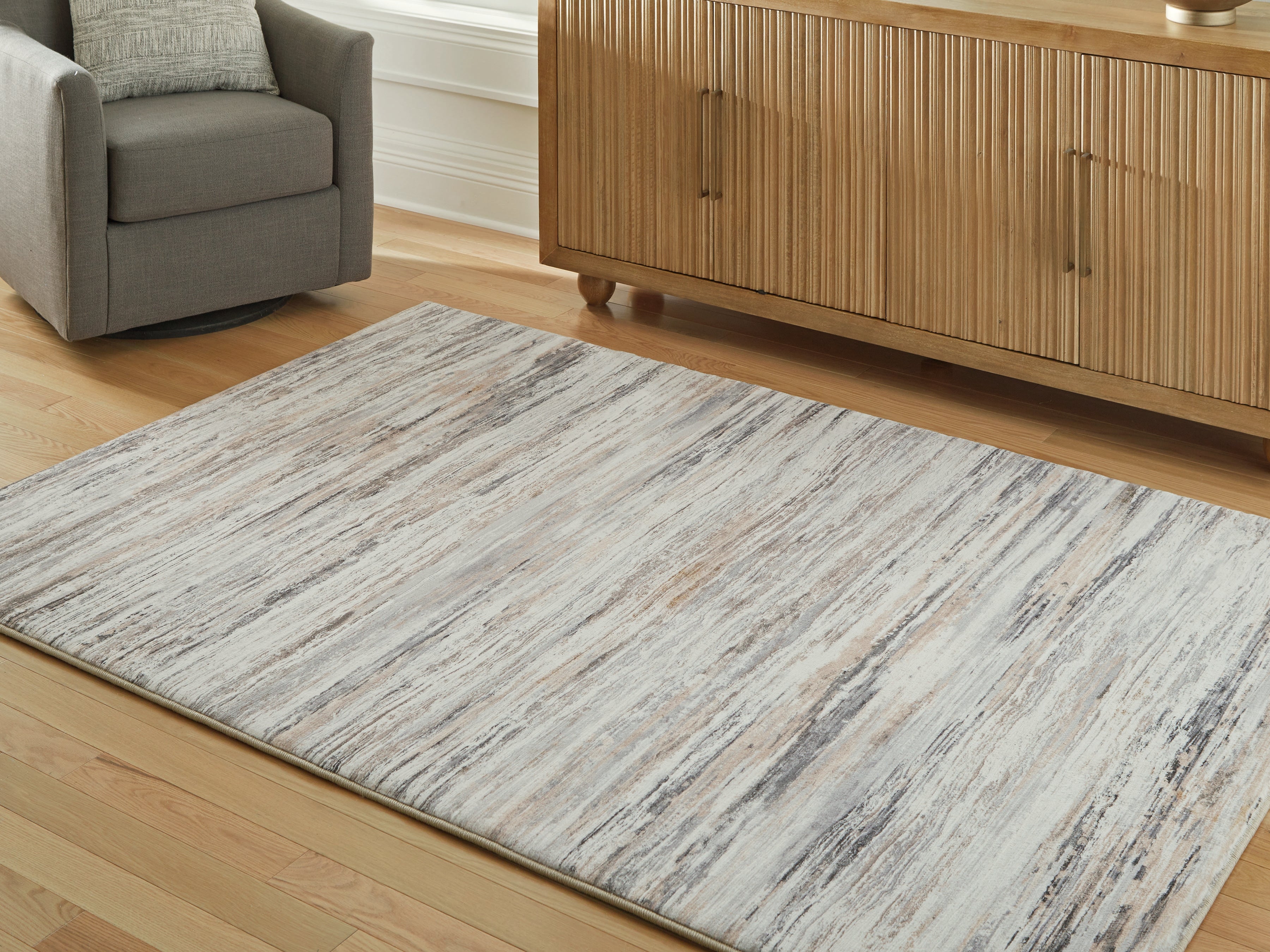 Orleans Furniture - Ashley Furniture - Nace Rug - 5' x 7' Area Rug / Gray/Brown/White - R407472