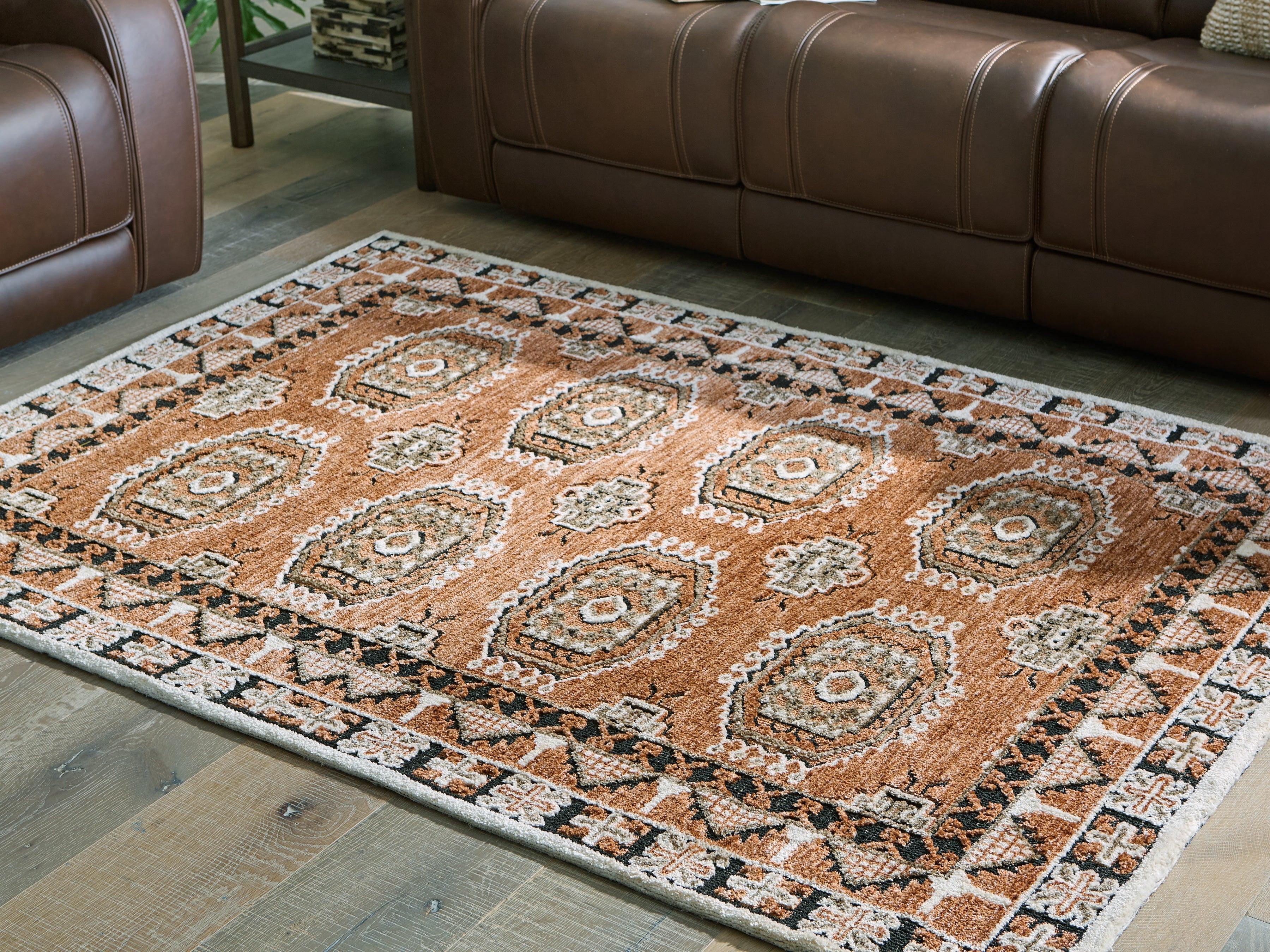 Orleans Furniture - Ashley Furniture - Qaabiz Rug - 5' x 7' Area Rug / Sienna/Ivory/Black - R407522