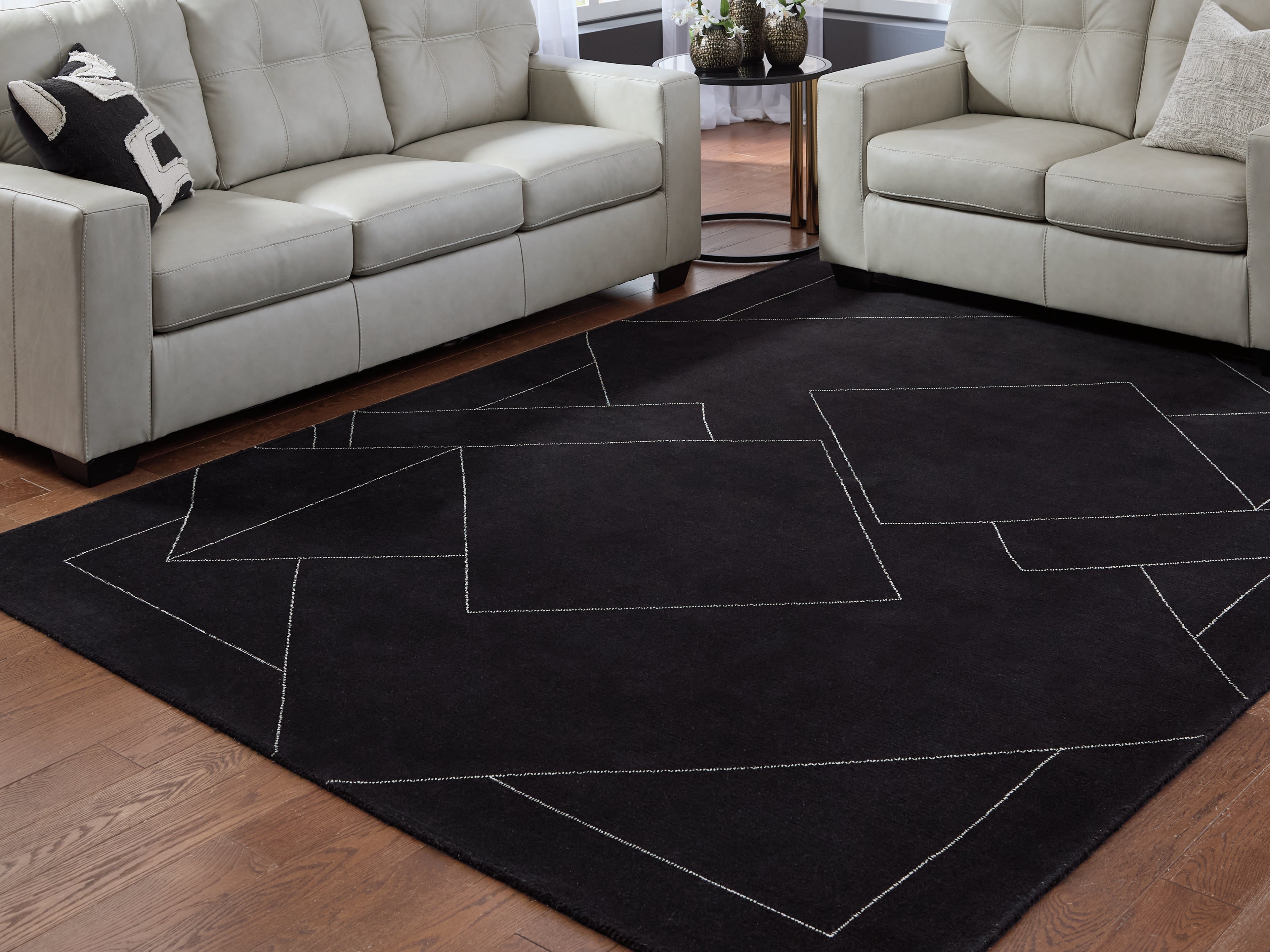 Orleans Furniture - Ashley Furniture - Marav Rug - 7'8" x 10' Area Rug / Black/White - R407531