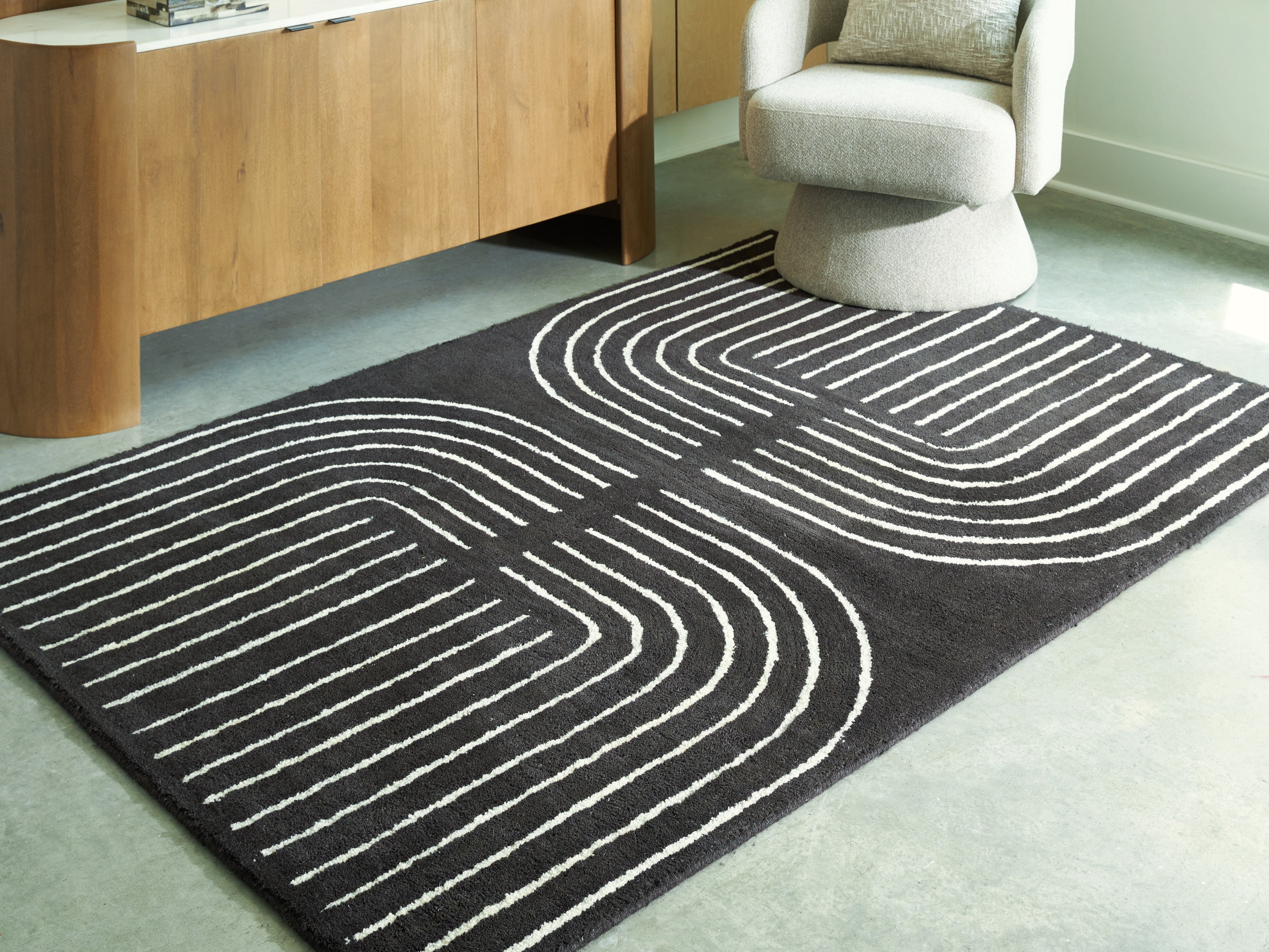 Orleans Furniture - Ashley Furniture - Eldonmore Rug - 5' x 7' Area Rug / Black/Ivory - R407572
