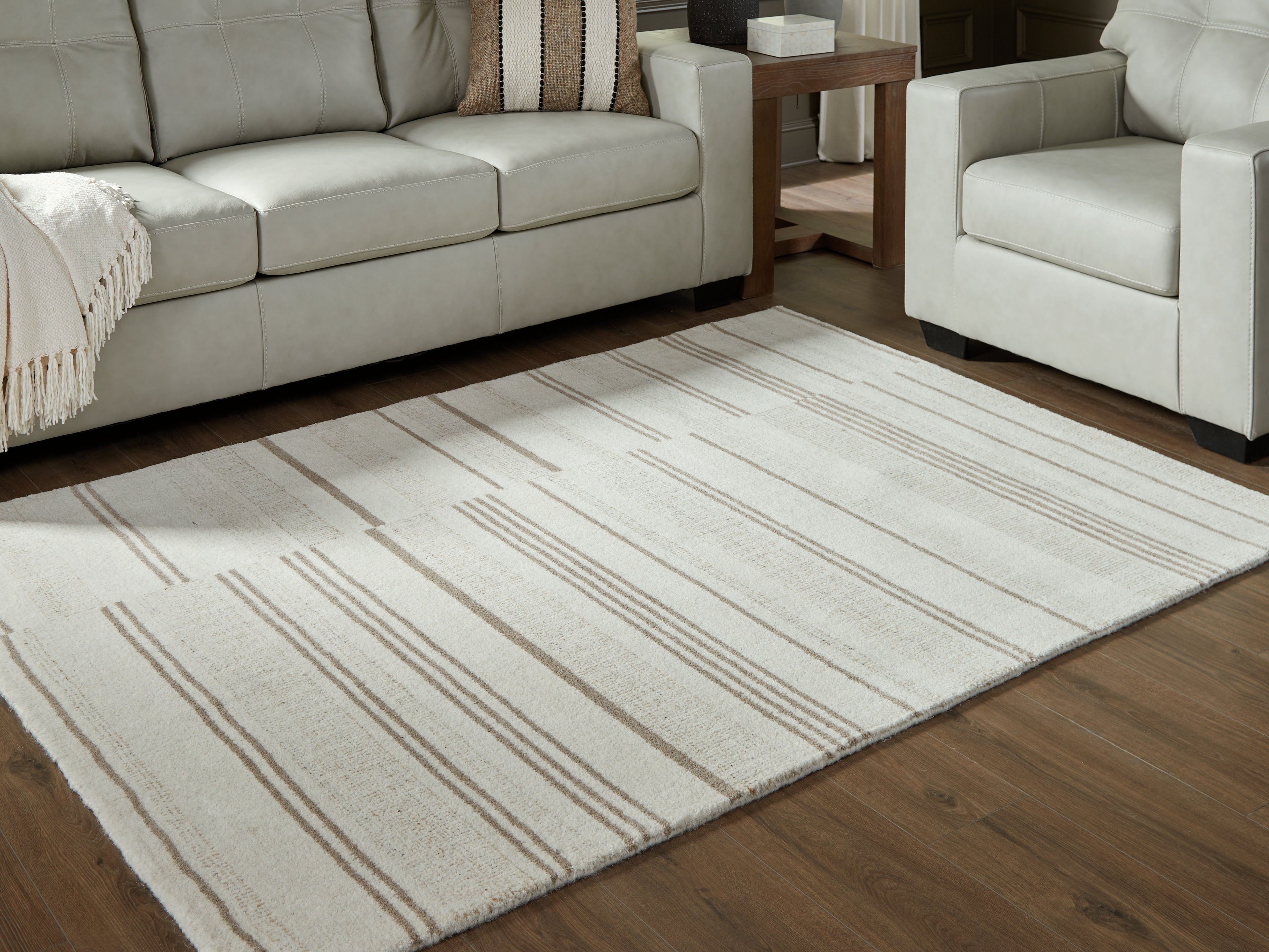 Orleans Furniture - Ashley Furniture - Gadence Rug - 5' x 7' Area Rug / Ivory/Tan - R407642