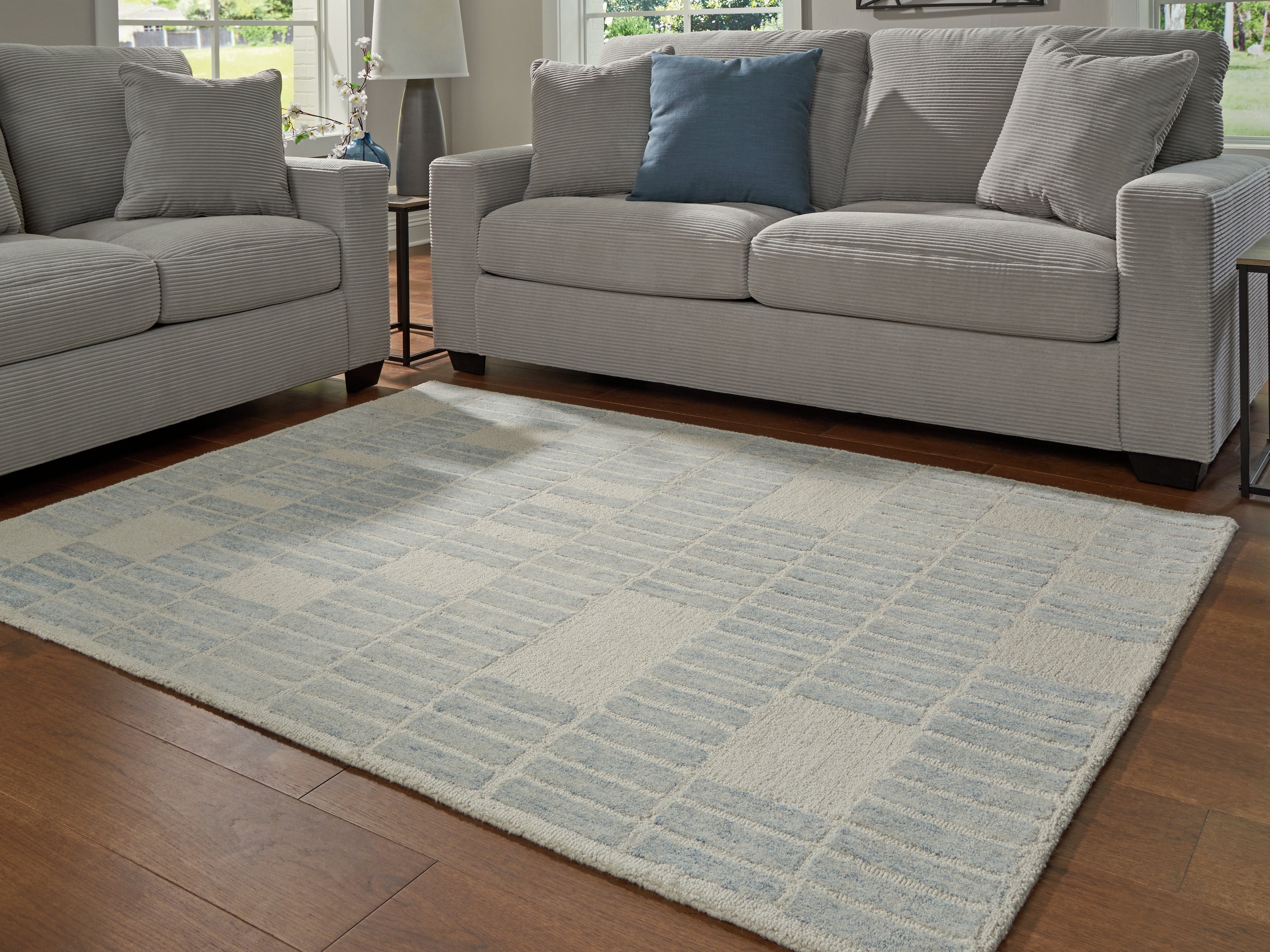 Orleans Furniture - Ashley Furniture - Dylanton Rug - 5' x 7' Area Rug / Ivory/Blue - R407812